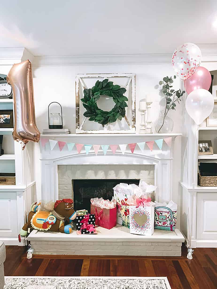 living room and mantle decor for first rodeo birthday party