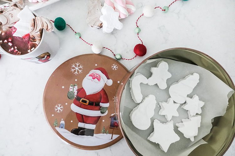 Homemade marshmallows in shapes of candy canes, snowmen, trees, starts, gingerbread men