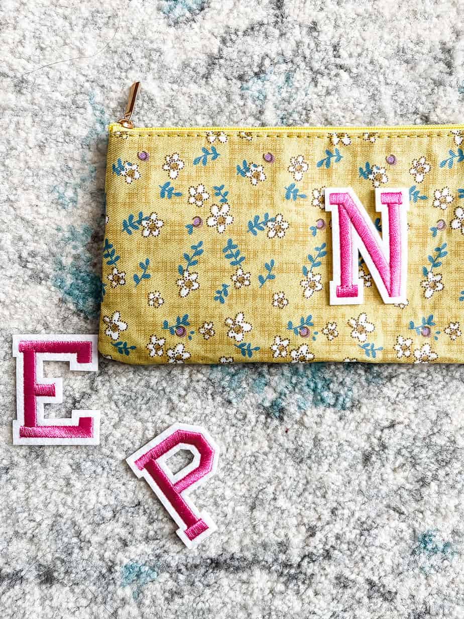 Stoney Clover dupe yellow floral pouch with personalized letter initial patch.